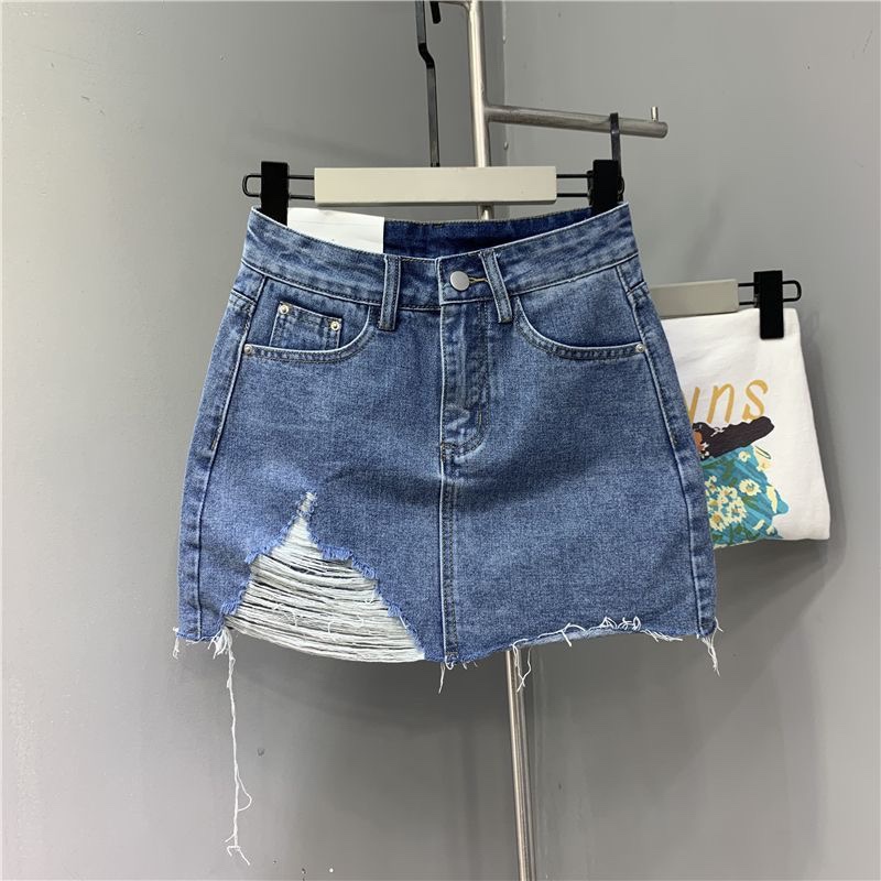 European and American cross-border foreign trade Amazon Fashion Women's washed frayed feet irregular Denim short skirt