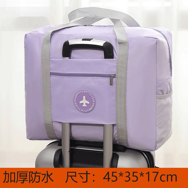 In stock multi-functional travel bag thickened Oxford cloth portable clothes storage bag can cover trolley case folding travel bag