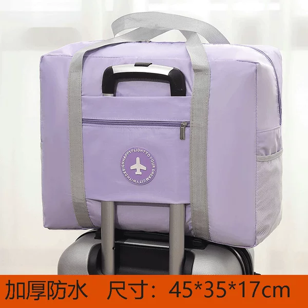 In stock multi-functional travel bag thickened Oxford cloth portable clothes storage bag can cover trolley case folding travel bag
