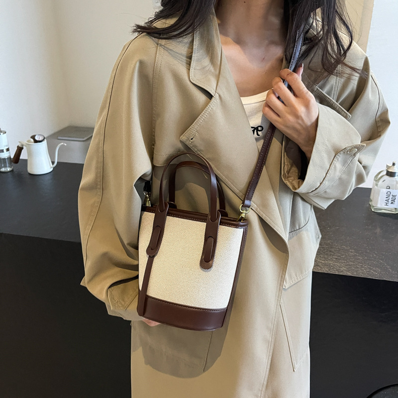 Bolsa de balde de color de contraste popular de este año 2026 nuevo bolso de hombro universal bolso de viaje simple de alta calidad