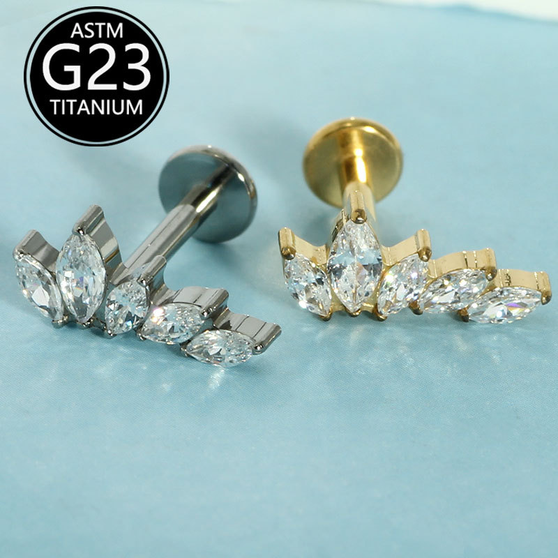 Silver pointed spike labret stud material detail