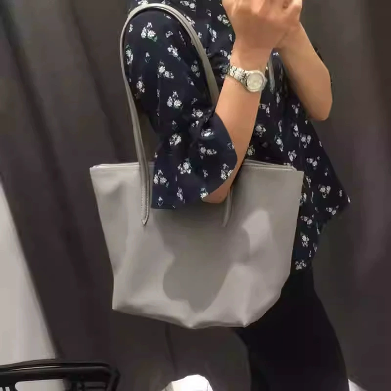 Fashionable big capacious bag one shoulder, french style, city style