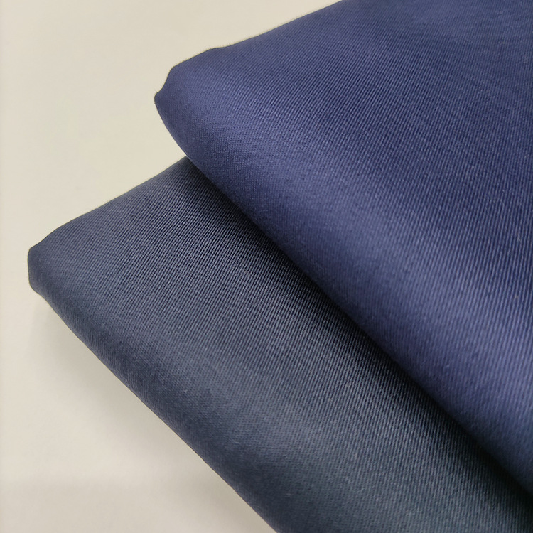 Venta caliente de color sólido tweed camisa elástica textil 190gsm tela de piel de melocotón