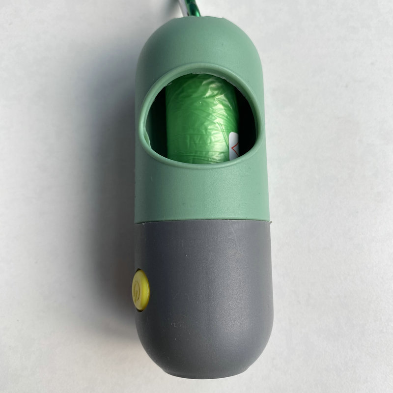 LED píldora mascota bolsa de basura distribuidor con luz perro inodoro Dispositivo de almacenamiento portátil mascota inodoro