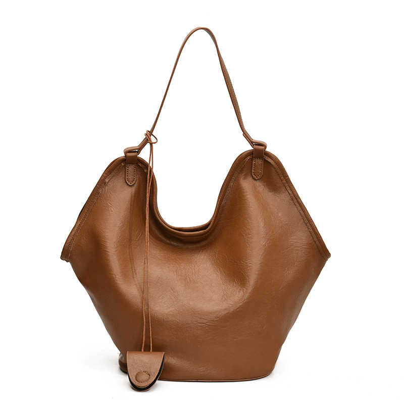 Bolsa de cubo transfronteriza de gran capacidad, bolsa de viaje retro de mujer 2025, otoño y invierno, nueva moda, bolsa de brazo, bolsa de hombro universal