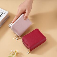 新型韓国版シンプル双ファスナー女性小銭入れ大容量マカロンレイシ紋百合クロスボーダー人気モデル
