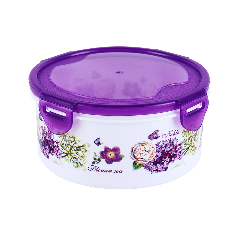 Caja redonda hermética para almacenamiento de alimentos, ideal para refrigerador, camping o uso doméstico.