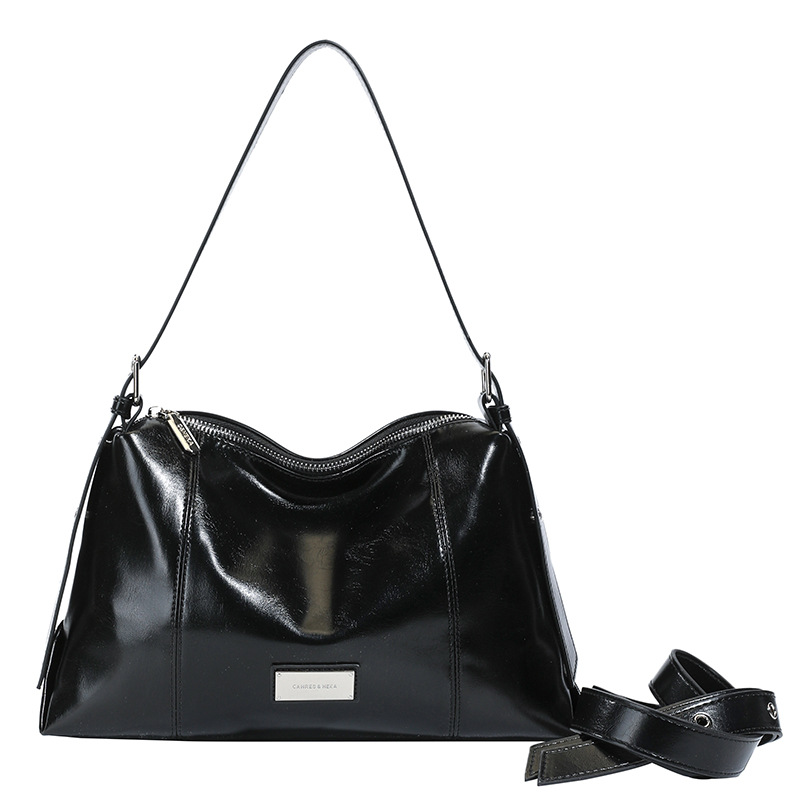 Transfronterizos retro bolsas de brazo de mano mujeres 2025 invierno nueva moda simple bolso de hombro universal mochila de viaje