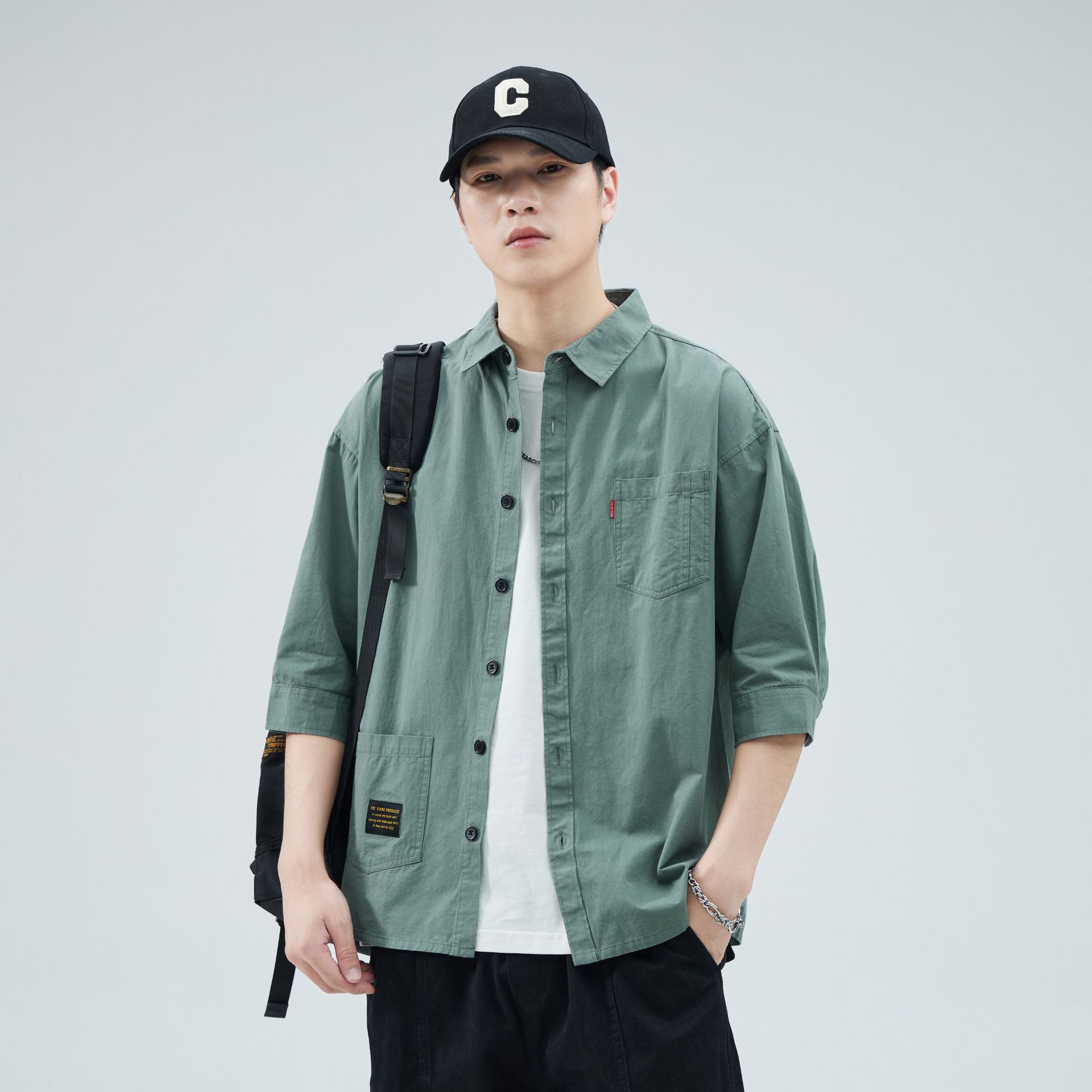 Camisas de primavera y verano para hombres, estilo americano de alta gama, estilo de moda de Hong Kong, estilo de varios bolsillos, camisa casual suelta