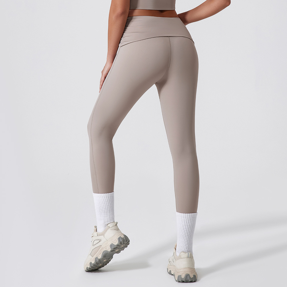 Europa y los Estados Unidos nuevos pantalones apretados rápidos y secos para mujeres torcer cintura alta y caderas pantalones deportivos para correr