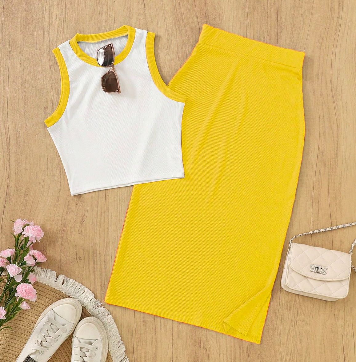 Blusa corta sin mangas de punto roscado para mujeres transfronterizas con traje de falda corta casual y elegante juego de dos piezas