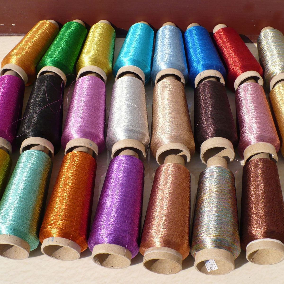 高亮玫瑰金刺绣纱大红银片绣线深蓝银片电脑针织布片子下摆用线