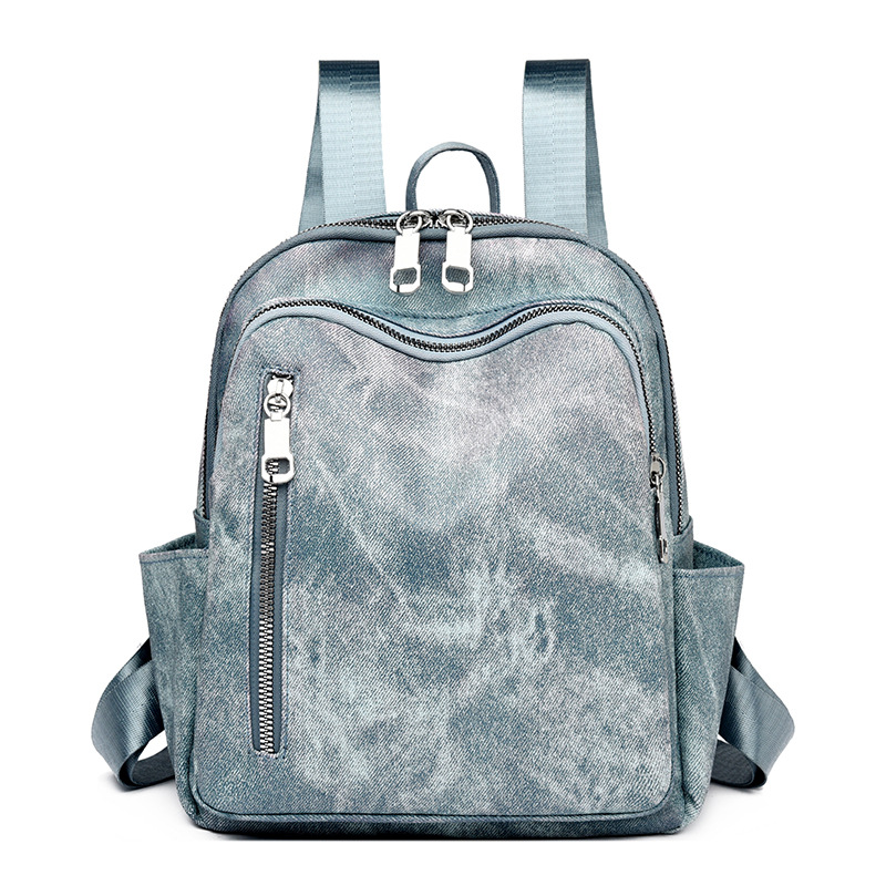 Mochila de todo fósforo de color puro para mujer 2024 nuevo estilo de cuero suave moda mochila de gran capacidad bolsa de viaje al por mayor