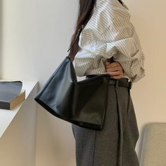 包包女2025新款秋冬真皮羊皮单肩斜挎邮差包小众设计高级感托特包