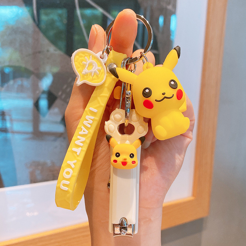 With nail polish scissors key chain set ear digging Spoon soft rubber doll car key chain bag pendant bag buckle set