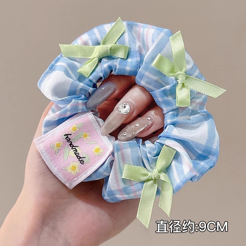 Anillo de pelo de intestino grueso súper grande coreano para mujer 2025 nuevo estilo de alta gama cordón de pelo de encaje plisado temperamento dulce cuerda de cabeza de flor