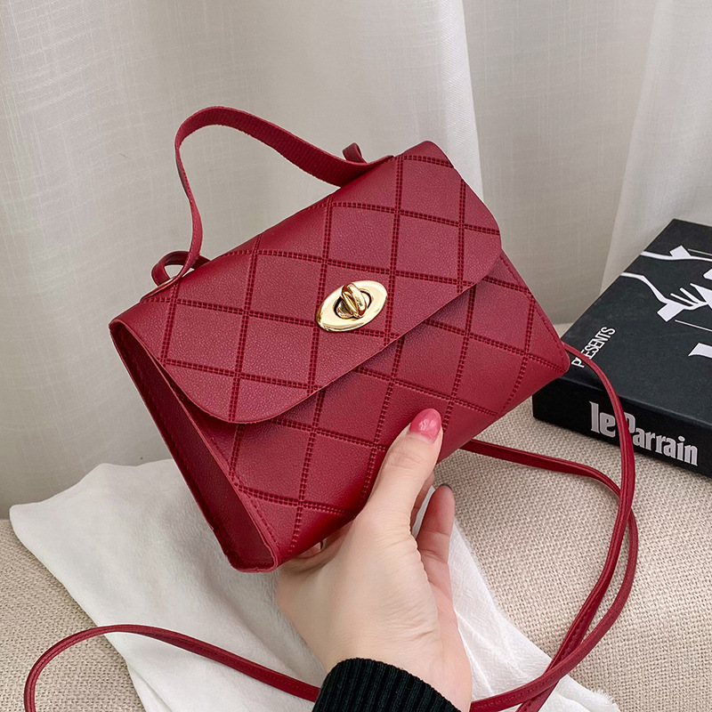Fresco bolso de reducción de edad2025 primavera y verano nuevos productos en relieve de diamante bolso de hombro de mujer bolso mayorista de comercio exterior