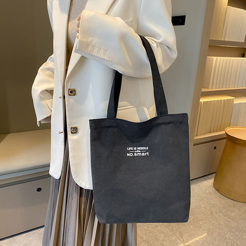 帆布包女文创国潮竖款斜挎包男生小背包ins单肩包学生风小包包