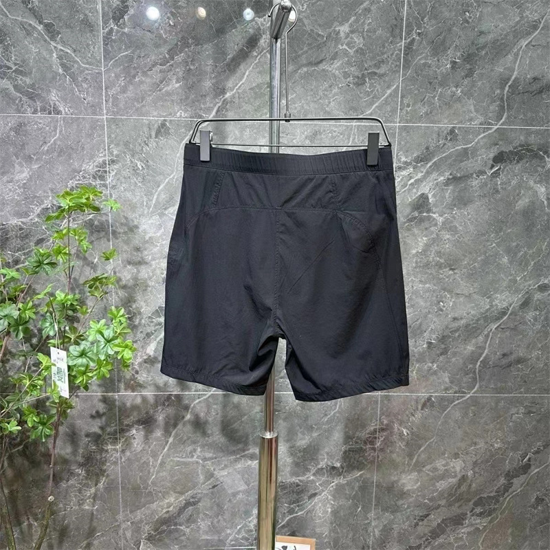 夏の薄いタイプのカジュアルなスポーツのスーツのショートパンツの男性の外は2025新型のファッションの刺繍の緩い速乾の5分のズボンを着ます。|undefined