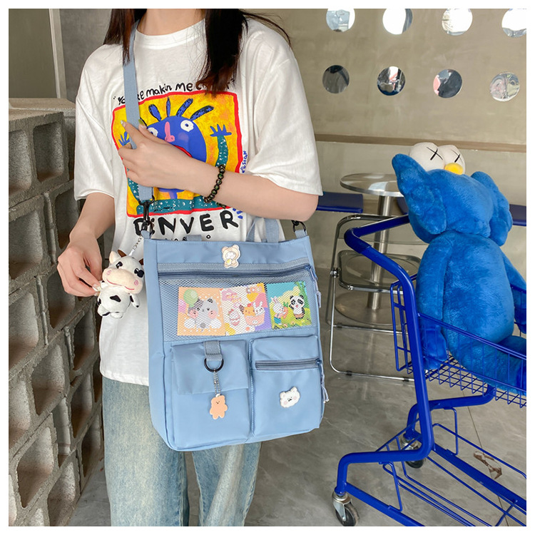 Large-capacity Japanese-style single-shoulder canvas bag for girls, versatile crossbody, ins, a tote bag for junior high school students' classes, and a schoolbag for after-school tutoring undefined