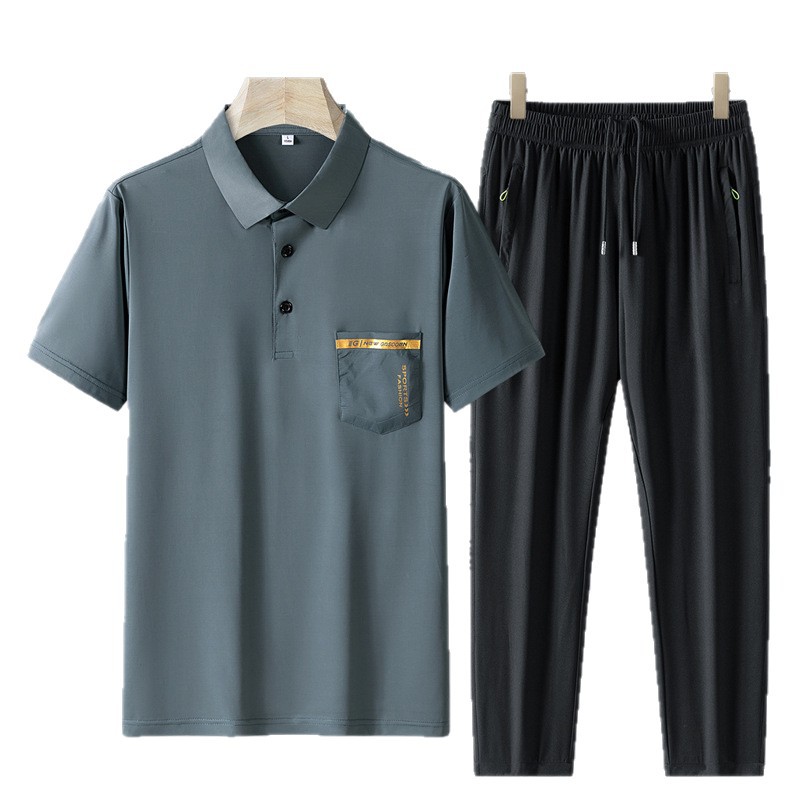 Papá con un nuevo conjunto de deportes casuales de mediana edad hombre de verano de manga corta pantalones largos de verano de hielo dos piezas