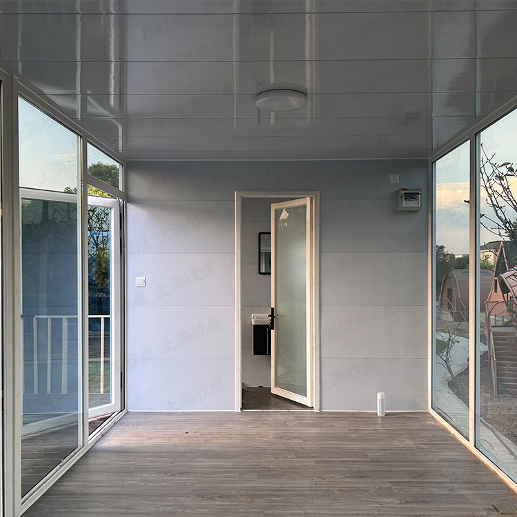 Residente Casa contenedor Casa integrada prefabricada Casa de tablero móvil con baño Distrito comercial Oficina móvil