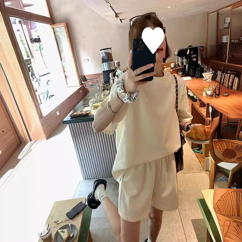 [Spot] casual sports suit women's summer new half sleeve round neck knitted top loose slim shorts