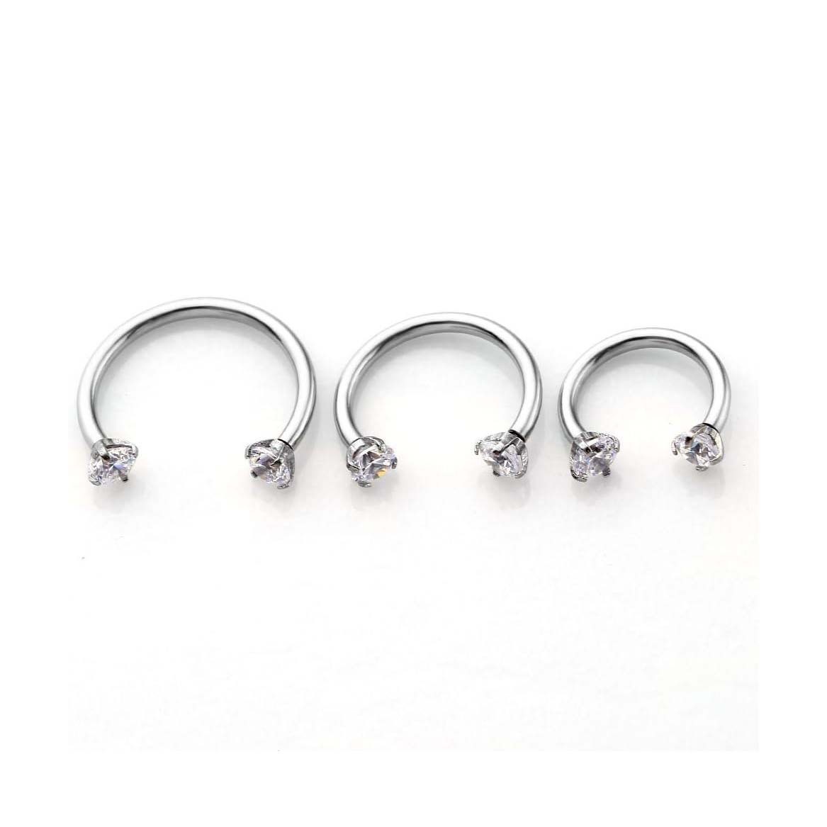 Piercing naso in titanio con ferro di cavallo e zircone_voghion.com