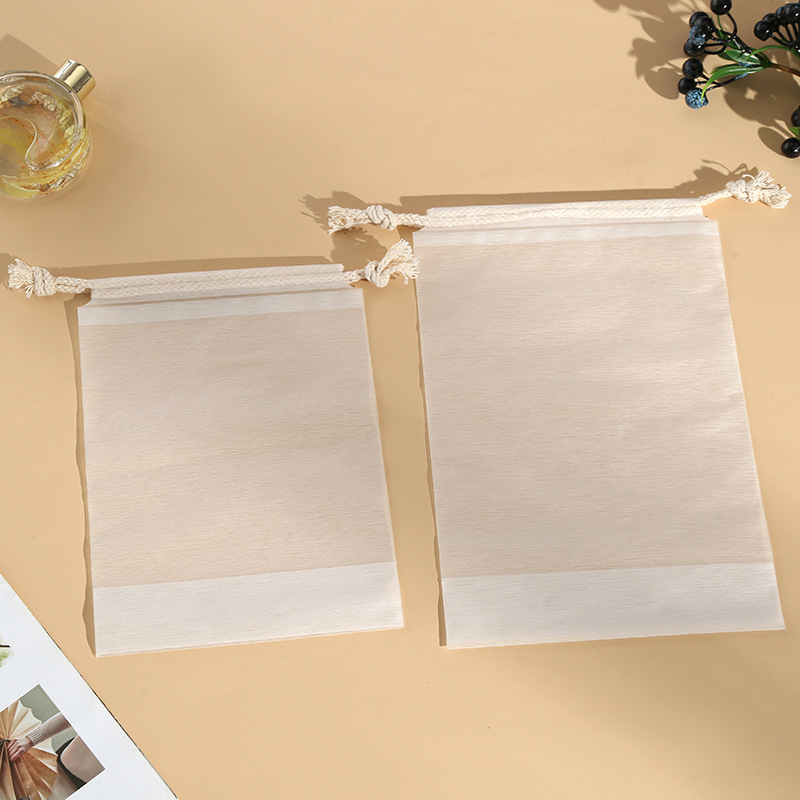 白色束口袋拉丝膜抽绳包装袋保暖内衣套装塑料包装袋磨砂通用包装