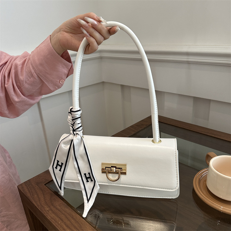 Alta sensación francesa nicho bufandas de seda extranjeras axila bolso de hombro 2021 nueva moda de este año bolso de textura popular