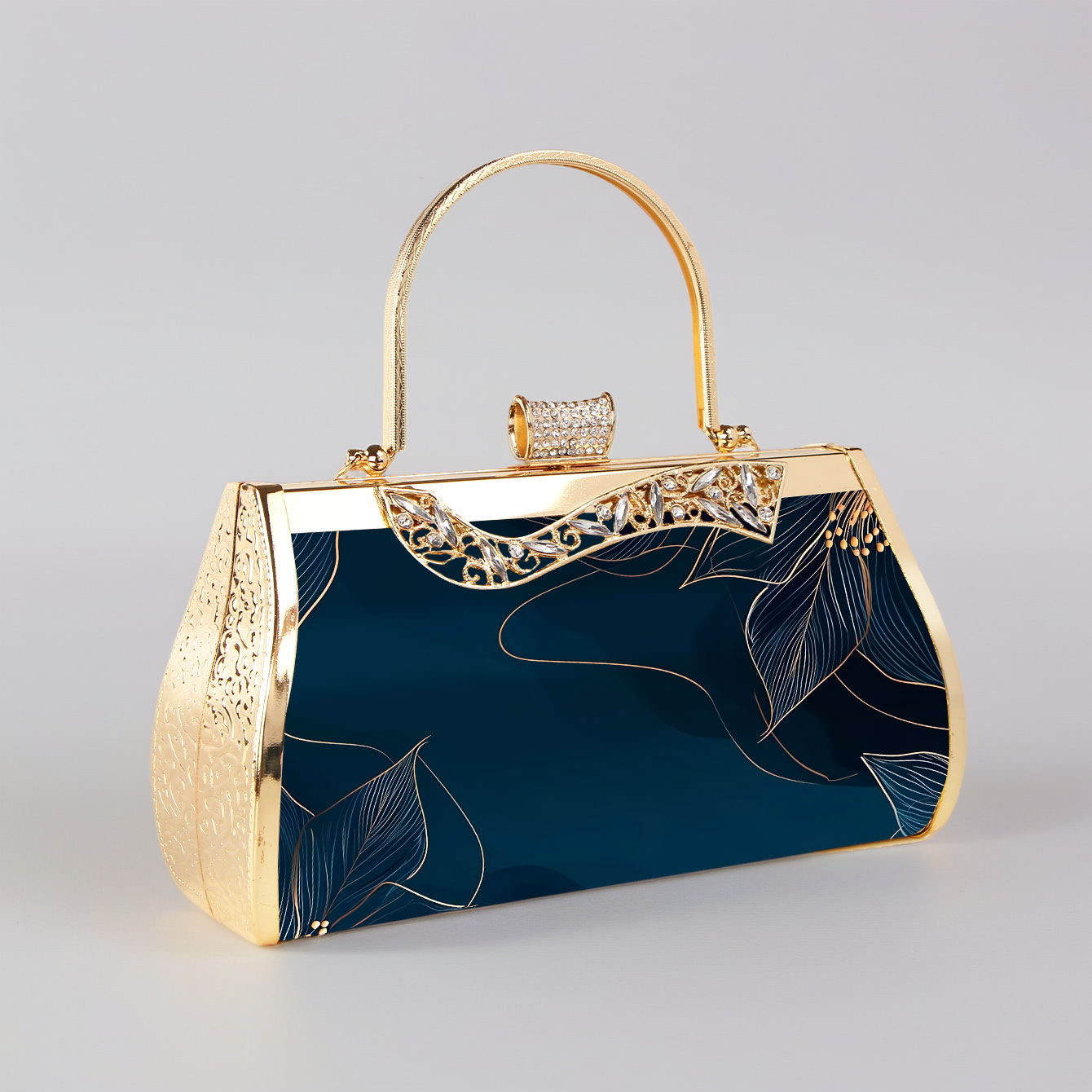 Pochette da sera elegante smeraldo con motivi floreali oro_voghion.com