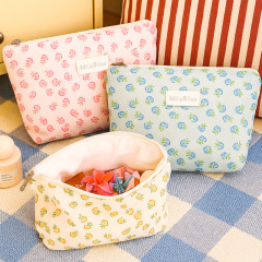 夏の新しい牧歌的なスタイルのメッシュフラワー高級化粧品袋スキンケア製品収納袋ポータブル手持ち化粧品袋