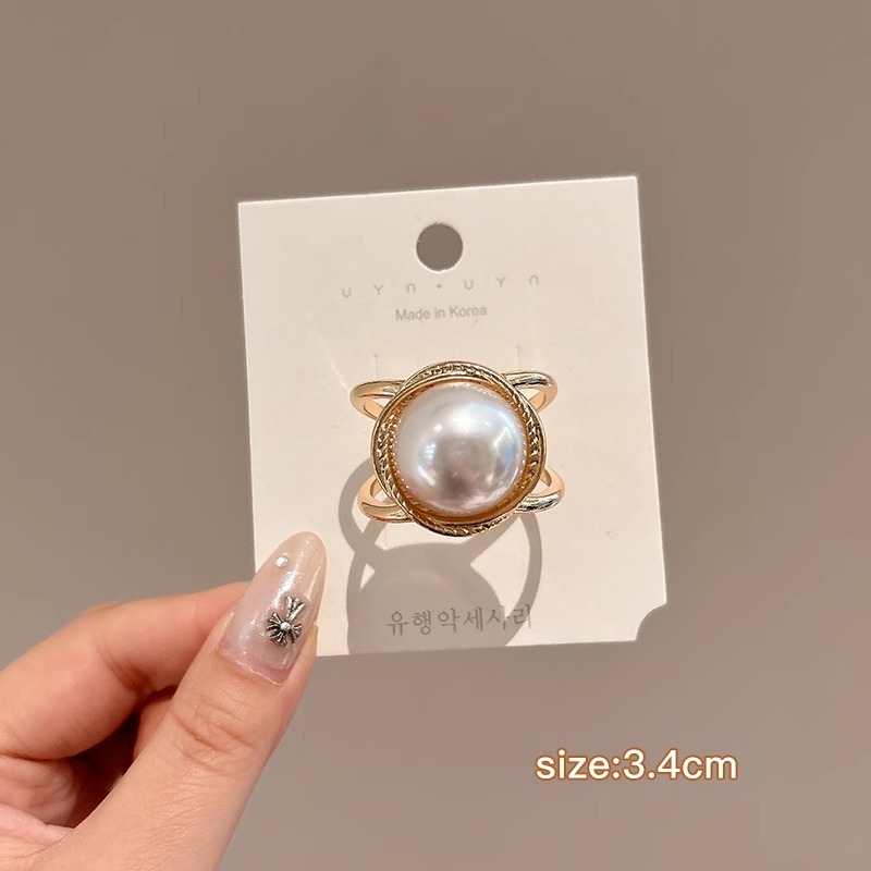 Botón de toalla de seda de alta calidad para mujer de alta gama 2025 nuevo estilo arco esquina anudada camisa de flores serpentina anudada hebilla anudada