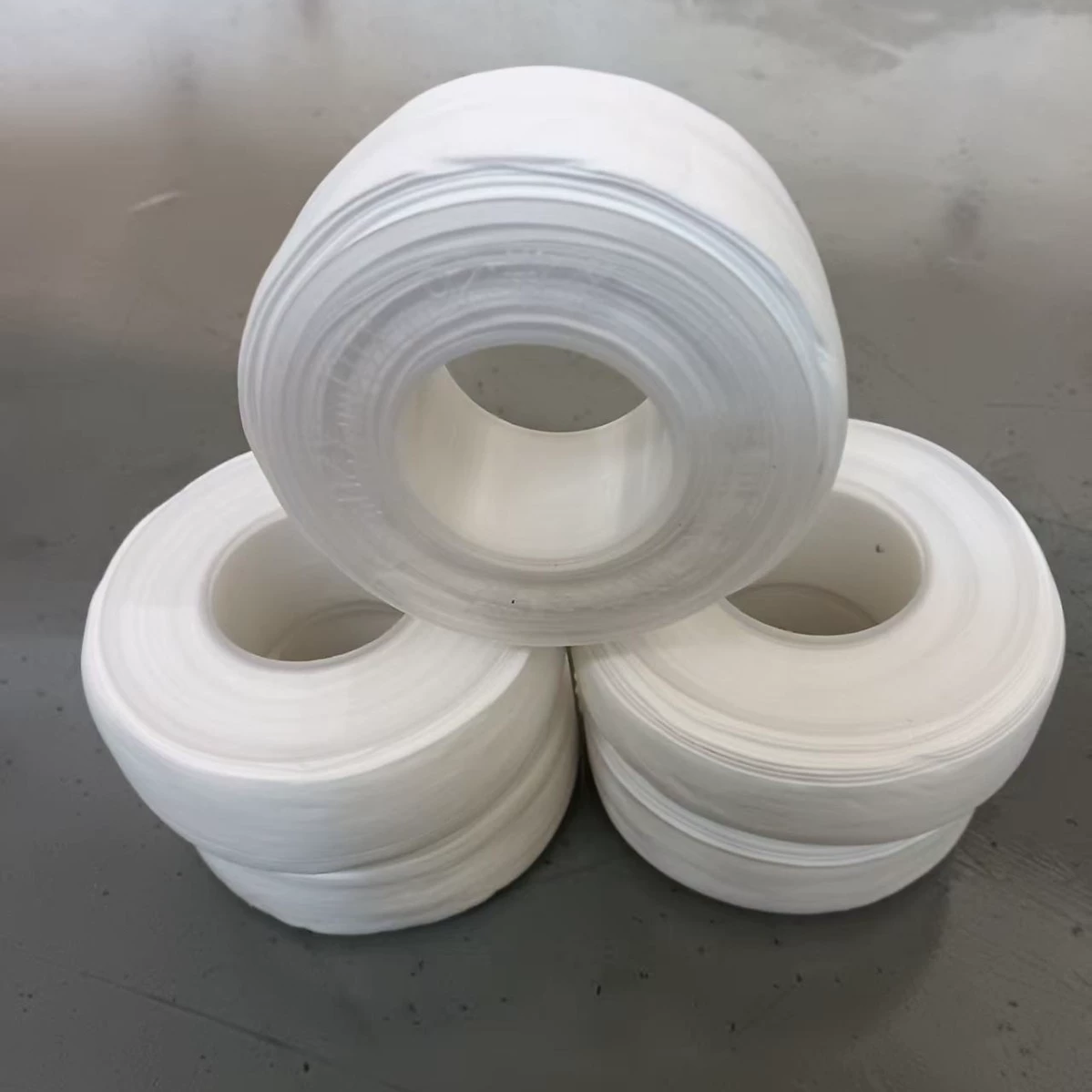 Прямые продажи производителя ремней для сырья. Новое обновленное высококачественное безмасляное ремень для сырья для инженерного использования, 20 грамм в рулоне.