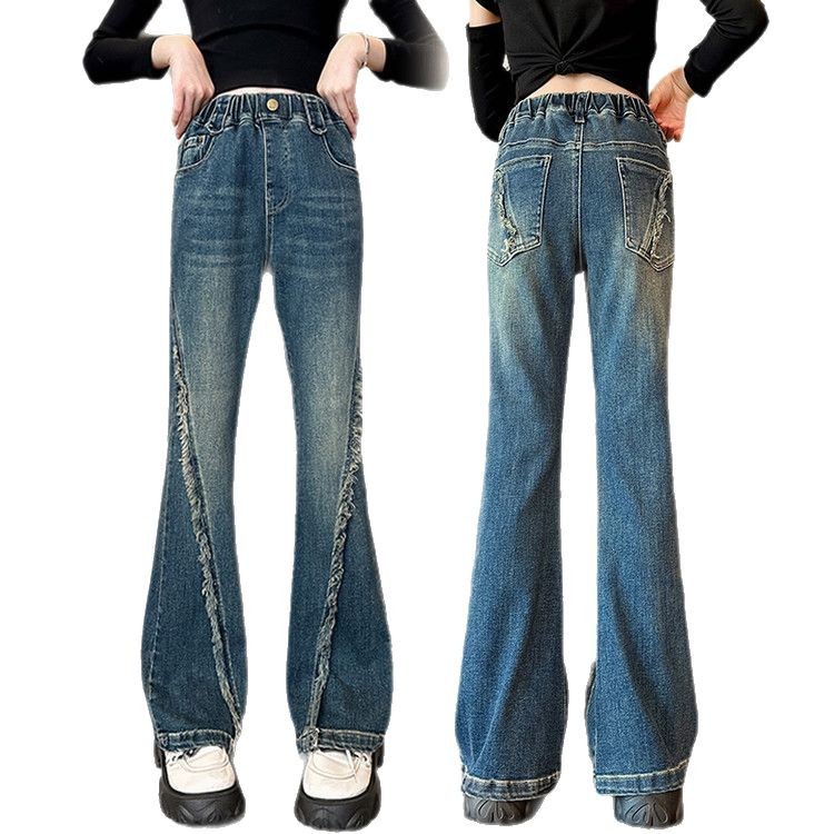 Jeans in denim effetto consumato per bambini con orlo grezzo e vestibilità comoda - Jeans elasticizzati in vita azzurri per ragazze, stile streetwear alla moda_voghion.com