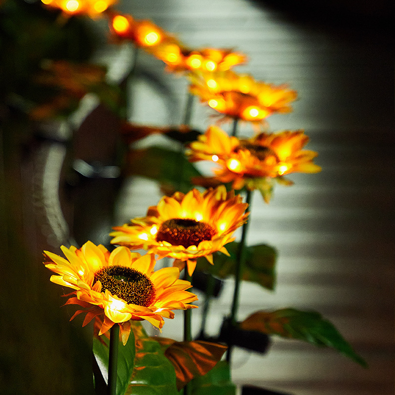 屋外の太陽エネルギーのヒマワリの花灯の庭の花園の芝生は明かりを飾って景観の植物の雰囲気の明かりをシミュレーションします。|undefined