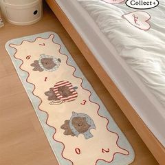 黒い皮の子猫はカシミヤのように厚くて柔らかい寝室の部屋のベッドの上のじゅうたんの家庭用の汚れに強い長いベランダの窓マットを作ります。