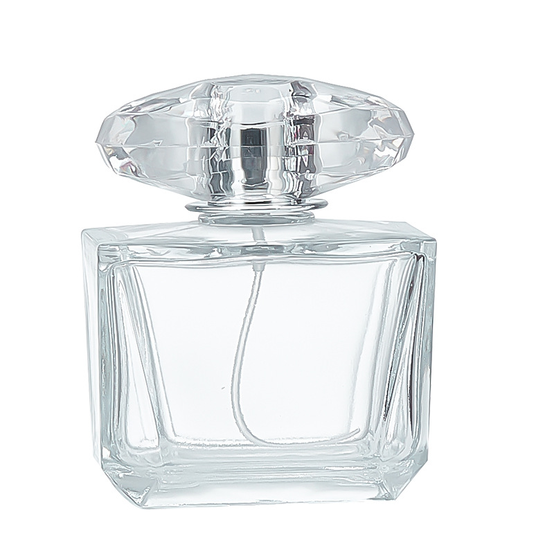 El fabricante vende botellas de perfume cuadradas al por mayor, presiona el spray y las botellas de vidrio transparente se dividen en botellas vacías de 30 - 100 ML.