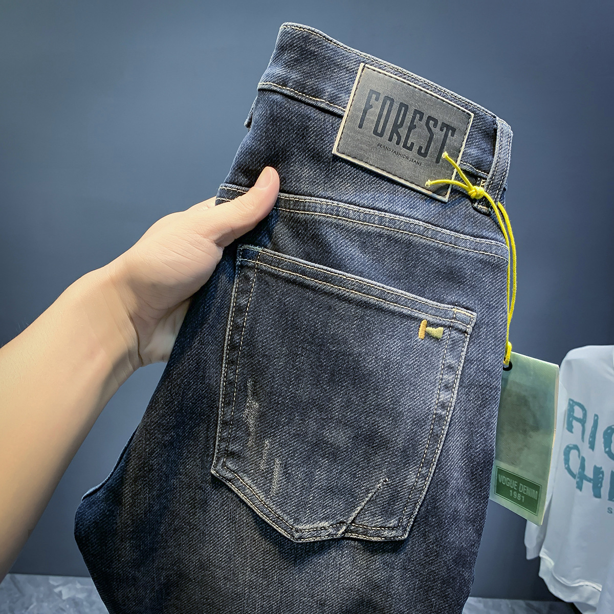 Jeans élastiques de marque de mode européenne pour les nouveaux styles de printemps et d'automne, pantalons polyvalents slim fit haut de gamme pour hommes_voghion.com