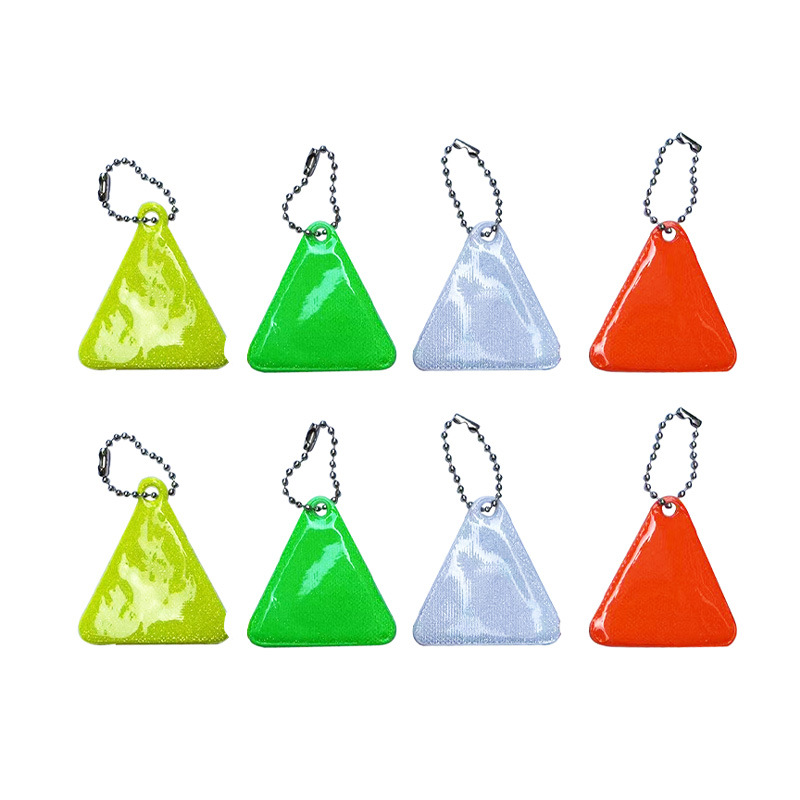 Colgante reflectante transfronterizo de seguridad infantil de dibujos animados en forma de triángulo llavero