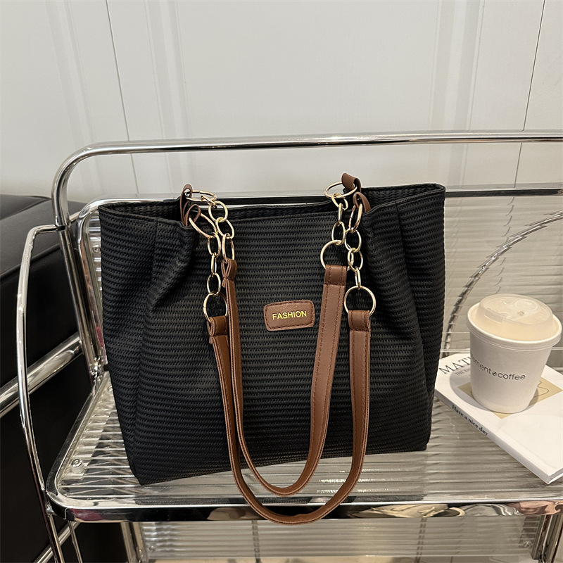 Bolso de viaje de gran capacidad para mujer 2025 verano nuevo estilo de alta gama bolso de axila de un solo hombro popular de este año bolso Tote femenino
