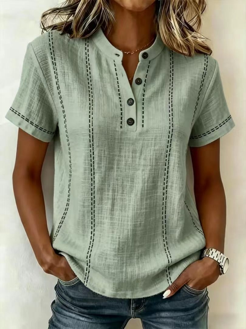 Transfronterizo 2026 estación independiente Amazon verano relajado casual explosión impresa botón de cuello de pie camisa de mujer de manga corta