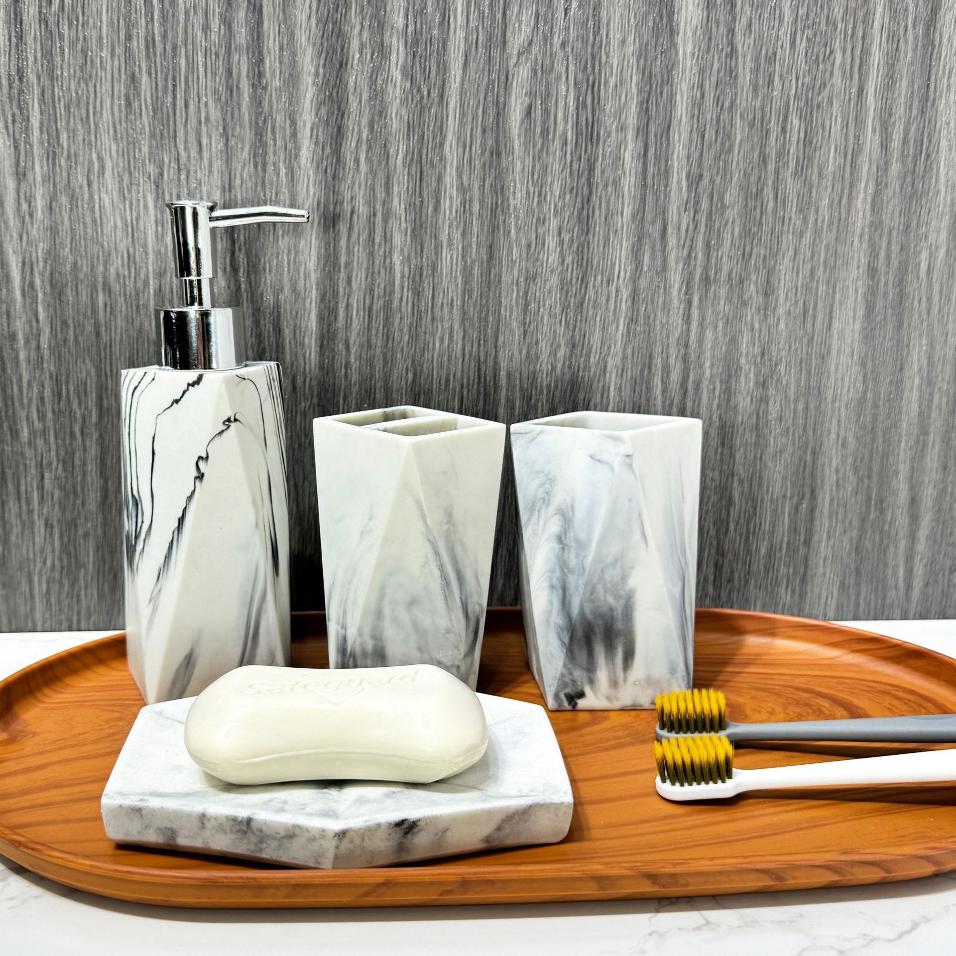 Juego de cuatro piezas con patrón de mármol de resina de baño de hotel, juego de lavado de baño para el hogar nórdico, botella de desinfectante de manos, plato de jabón