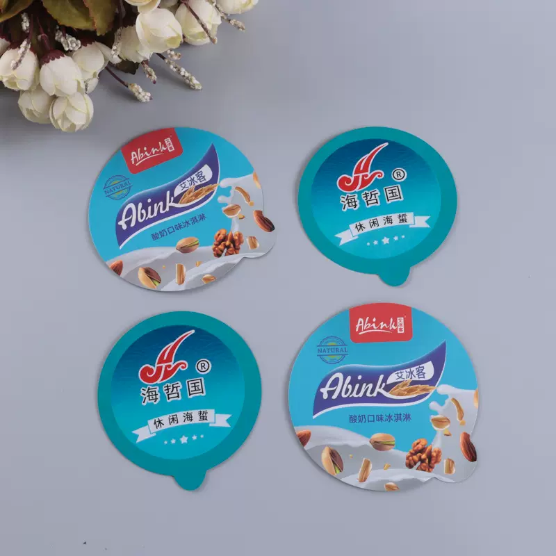 厂家批发可按需设计logo 奶茶杯饮料封口膜果冻包装膜密封