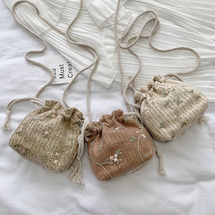 Women's woven bag 2022 new fashion lace all-match ins drawstring bucket bag shoulder crossbody straw bag