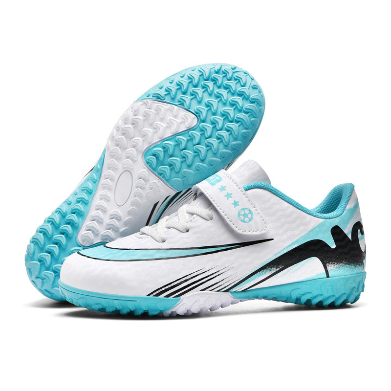 2025 nuevos zapatos de fútbol para niños explosivos, transpirables y cómodos, deportes bajos, uñas rotas, césped, hombres y mujeres, ventas directas de fábrica de trabajo infantil