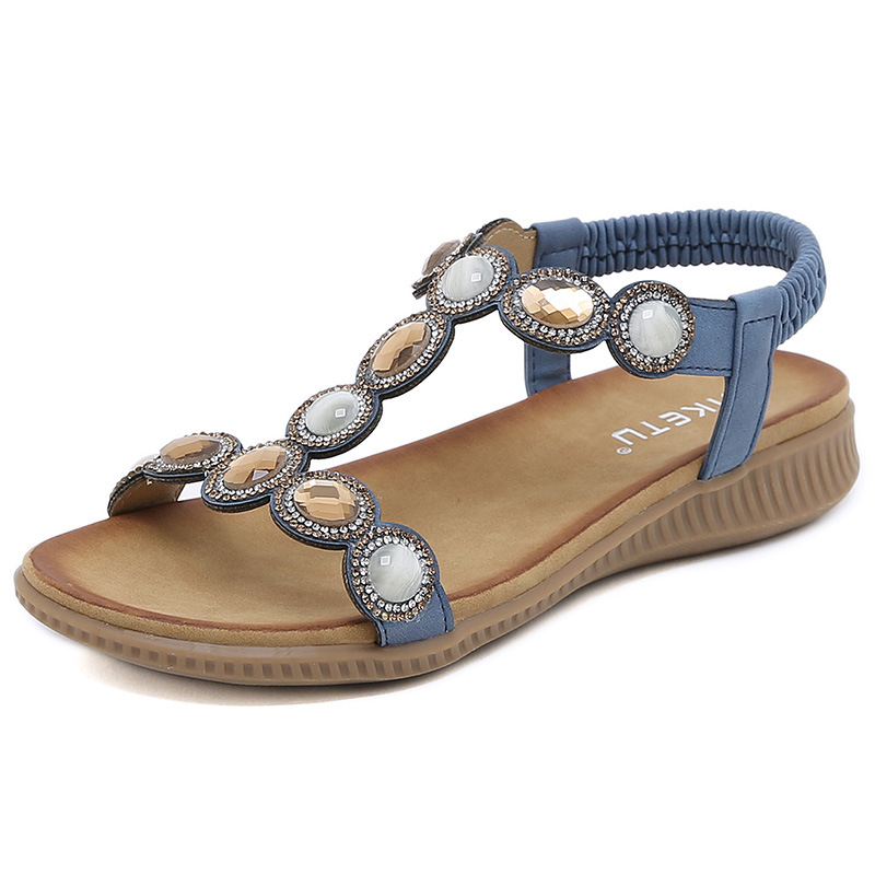 En stock 2024 nuevas sandalias europeas y americanas Bohemia rhinestone cabeza redonda cómoda vacaciones junto al mar más tamaño zapatos planos