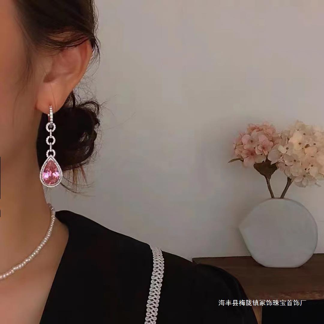 Elegant earrings with zircon drop-shaped
