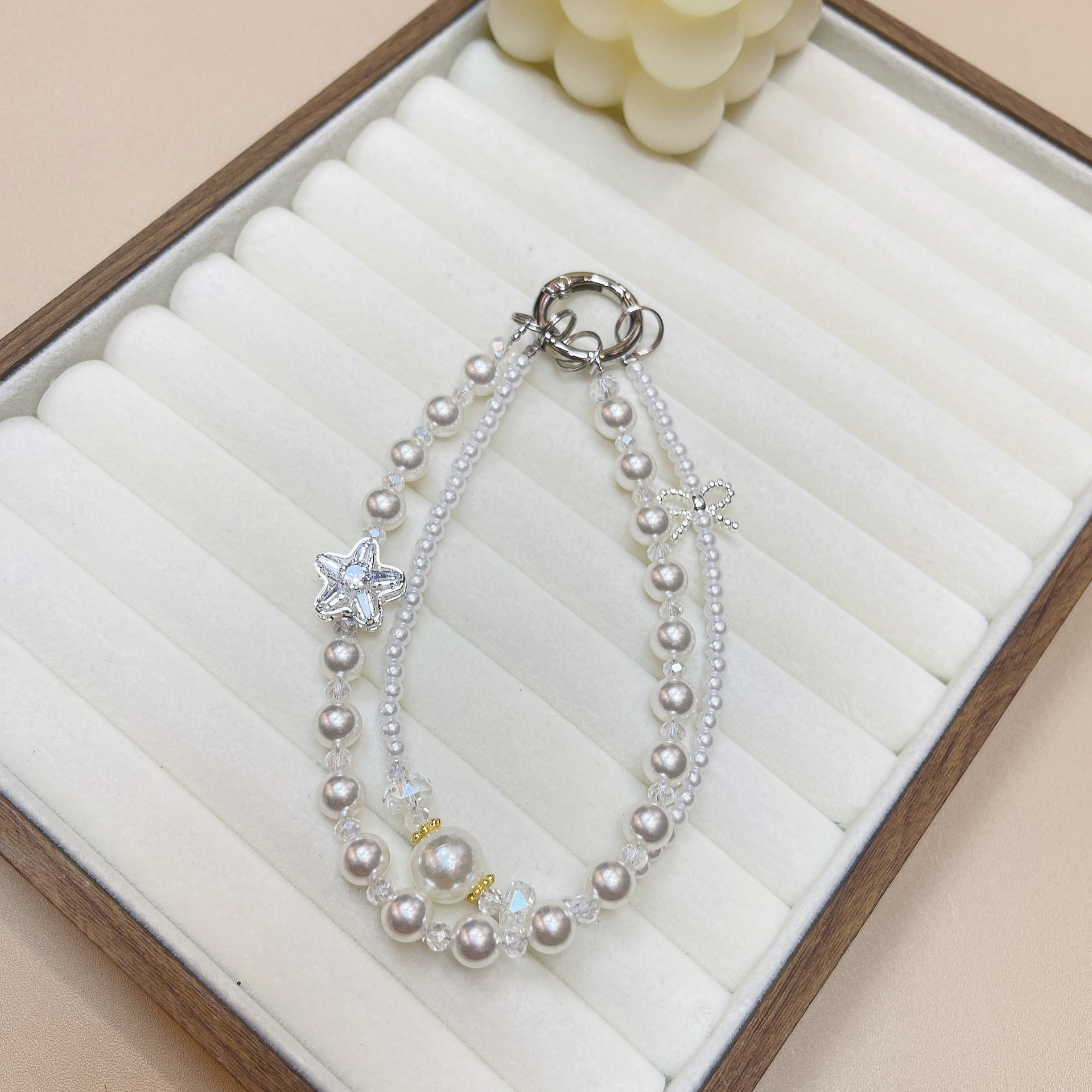 Cordón de teléfono móvil de doble cadena de cristal de moda cordón de muñeca con cuentas de alta gama colgante de estrella llavero de perlas cabello de una pieza