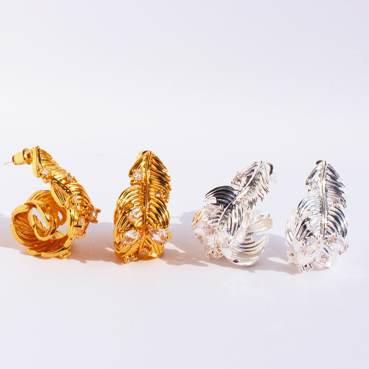 Small design three dimensional elegant earrings with zircon